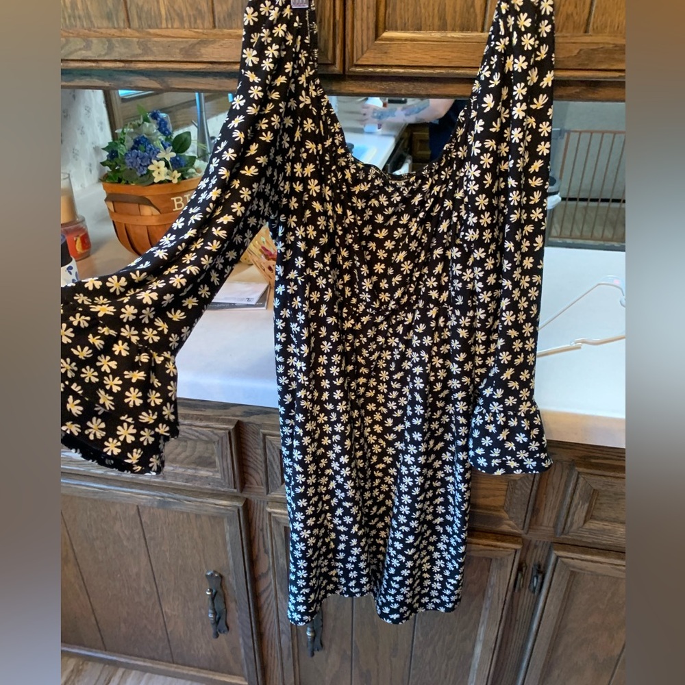 Floral Black and White Dress in great condition. Wear on or off shoulders.